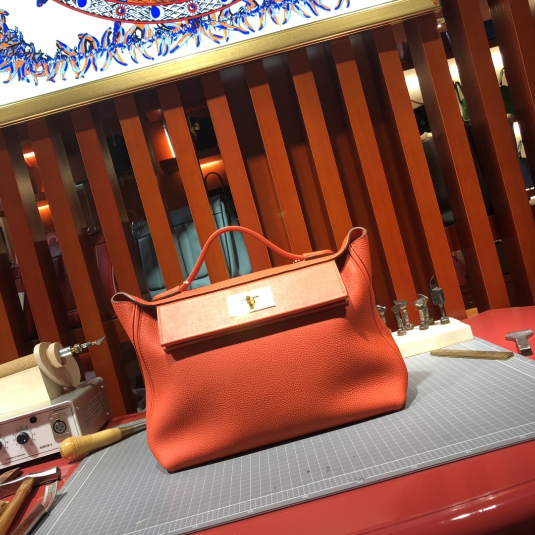 爱马仕凯莉包价格 Hermes Kelly24-24 火焰橙进口Togo小牛皮凯莉包29CM 银扣